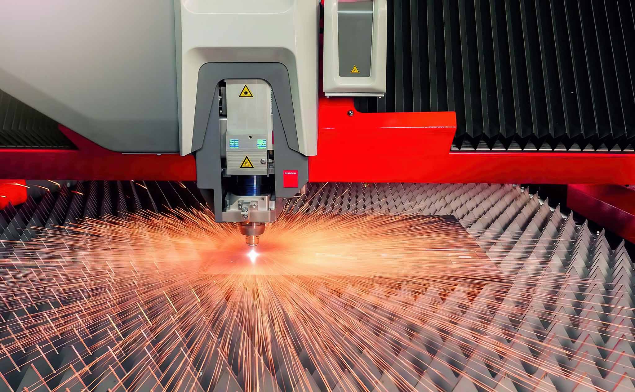 Advanced Laser Cutting and Press Cutting Services at Apollo Engineering featuring a Bystronic Laser Cutter Machine